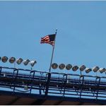 The American flag that waves above the stadium